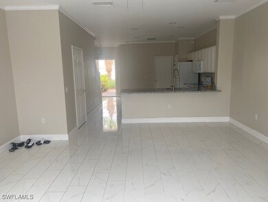 Unfurnished room with crown molding