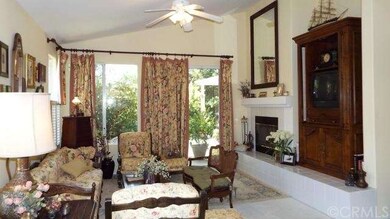 Bright great room with soaring ceilings, raised he