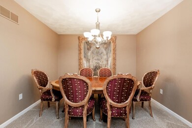 Your formal dining room with beautiful arched door