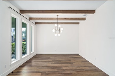 Custom wood beams in dining room