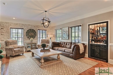 Great Room with Exposed Brick Wall, Gas Fireplace 