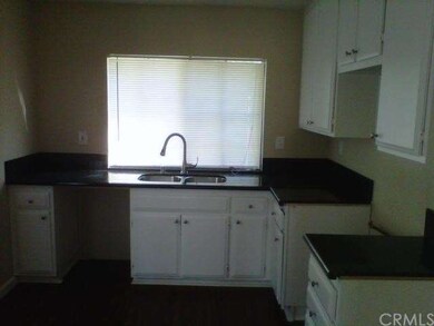 New granite counter tops. Kitchen features an eati