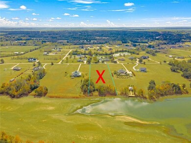 Aerial view of the rear of the acreage