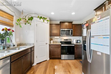 Kitchen featuring appliances with stainless steel 