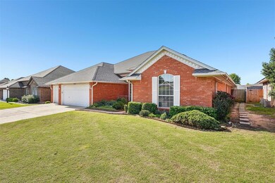Ranch-style house with fence, an attached garage, 