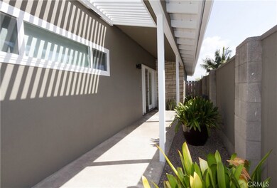 Covered walk to the entry doors.