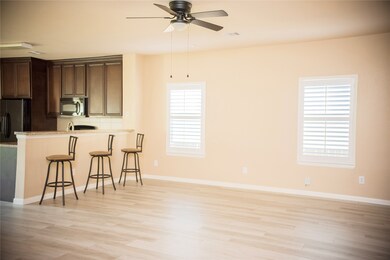 Beautiful open living area with plantation shutter