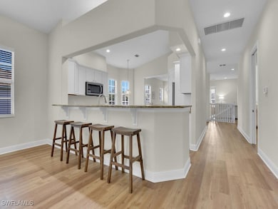 10540 Marino Pointe Dr unit 304, Miromar Lakes, FL 33913 - photo 7