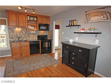 Kitchen - Renovated in 08' with wood floor,custom 