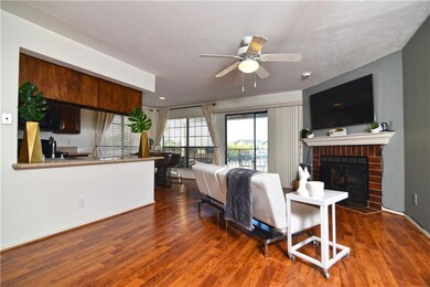 Open floorplan, gorgeous floors, and a fireplace O