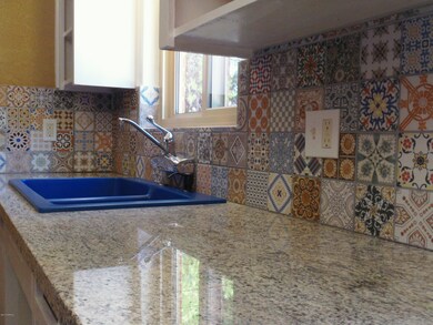 Granite & Backsplash tiled