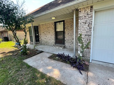 Lovely covered front porch perfect for drinking co
