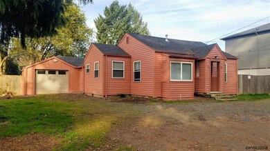 Garage in full view on NW front corner.