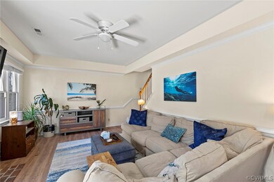 Living room featuring dark hardwood / wood-style f