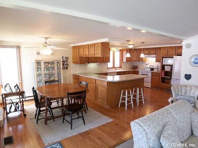 Kitchen Dining. The hardwood floors sparkle to enh