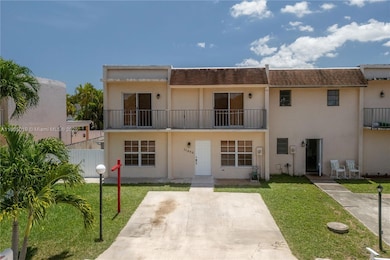 Front of structure with ample parking.