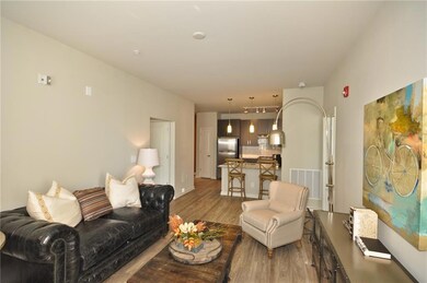 Living room featuring hardwood / wood-style floori