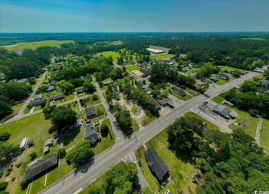 Aerial view of property and surrounding area