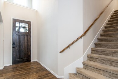 A 2-story entryway makes the home feel light and bright!  Freshly painted in 2022 makes this home move-in ready!