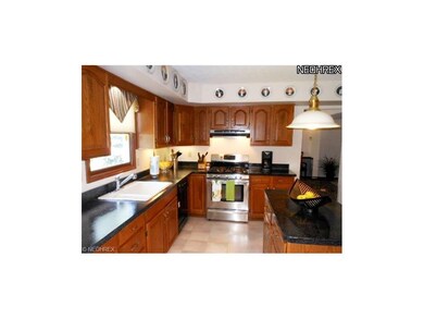 Easy access off Eat-in kitchen to large backyard t