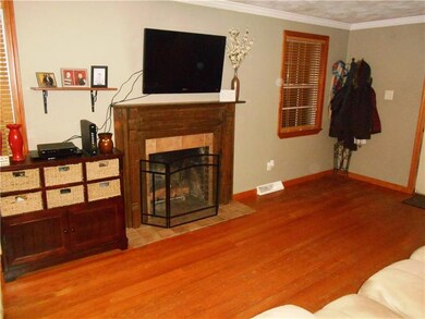 The log burning fire place is a focal point in thi