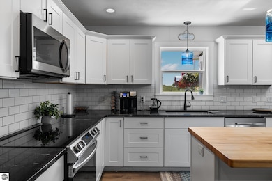 6330 Lund Rd SW, Fife Lake, MI 49633 - photo 5