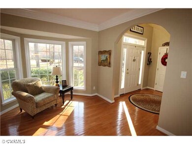 Living Room - Living Room with wood floors, crown 