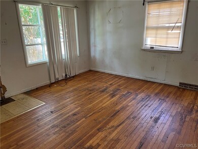 Spare room featuring plenty of natural light and d