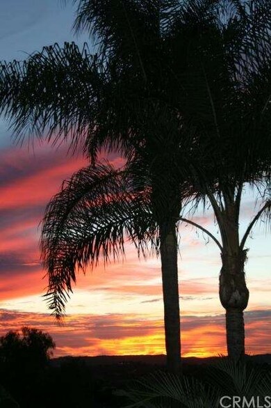 Gorgeous sunset viewed from the master bedroom dec
