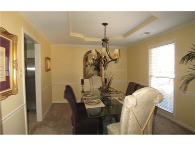 The formal dining room is just off the entry and o
