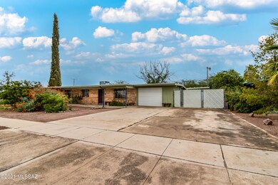 Front of house with extra parking
