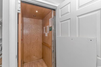Dining room with light wood-type flooring, a notab