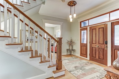 The transom windows above the oversized front door