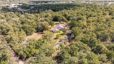 Aerial view of a heavily wooded area