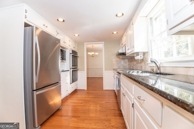 4582 Warrior Trail SW, Lilburn, GA 30047 - photo 6