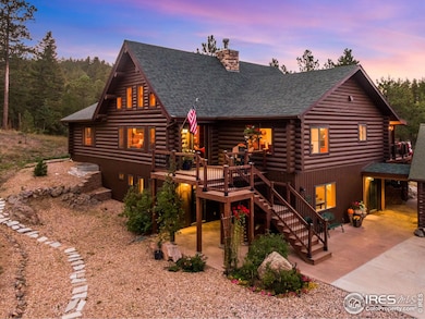 This luxurious log home sits on a 35-acre timbered lot and features abundant wildlife, a seasonal creek, rolling terrain, meadow and aspen grove.