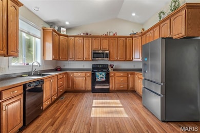 Huge kitchen with vaulted ceilings.