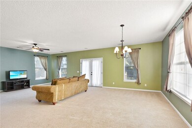 Second floor main living area with doors to rear d