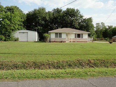Exterior Front. View of shop on the left