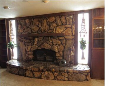 Petrified wood fireplace in family room