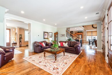 living room open to foyer and to kitchen