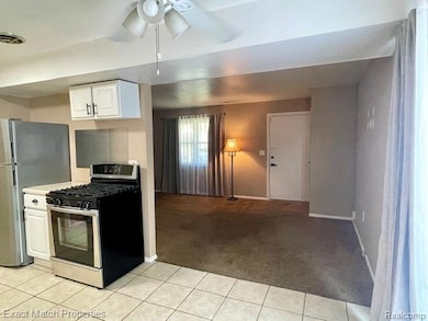 Ceramic tile in the expansive kitchen.