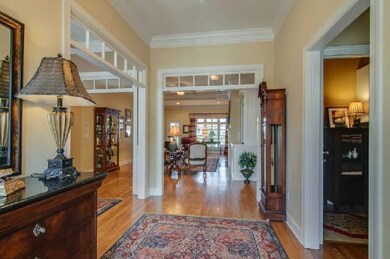 Step inside to gleaming hardwoods, open floor plan, beautiful mouldings, transoms, and an immediate feeling of elegance and style.  
