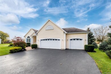 3 car attached garage! Parking space for all the t