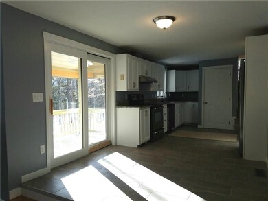 View of kitchen and covered porch