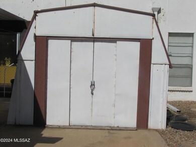 Shed by carport