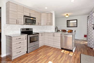 NEW contemporary styled kitchen with open floor pl