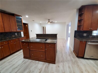 Kitchen Island with New Cooktop and Wine/Beverage 