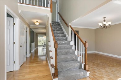 Entryway with Dining Room to the Right.  New carpe