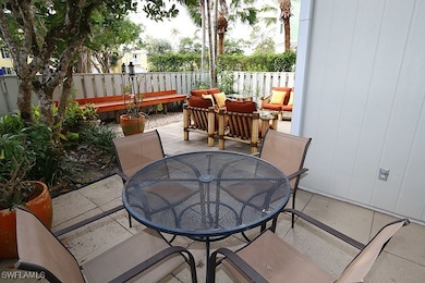 Fenced backyard featuring outdoor dining area, a p